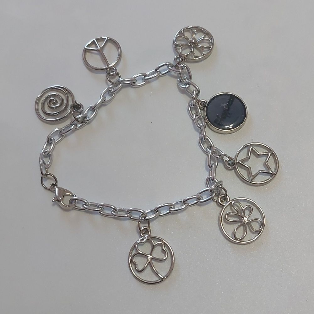 Happiness Statement Bracelet Multi Charm Star Flower Peace Shamrock Minoan Swirl